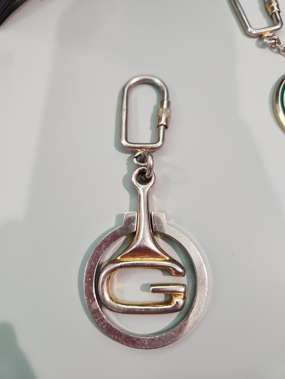 Gucci Two-Tone Silver and Gold G Logo Keychain - Picture 2 of 5